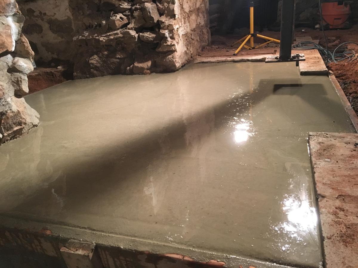 Cement slab for basement landing is poured